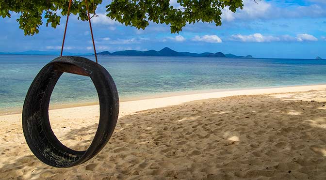 tire swing on secluded Philippine beach
