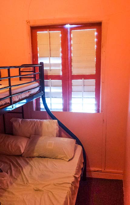 Pink hostel room in Singapore