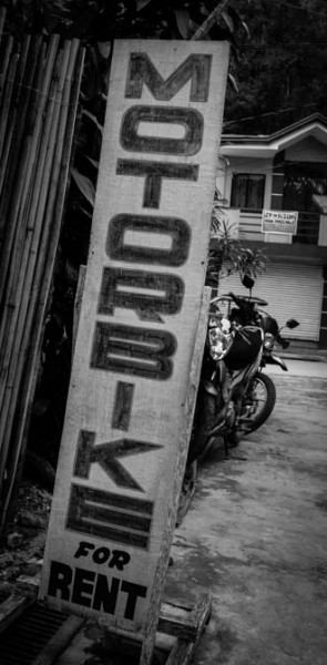 Motorbike rental shops littered the streets. 